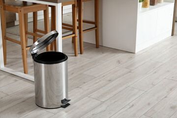 Poster - Opened trash bin in interior of light kitchen