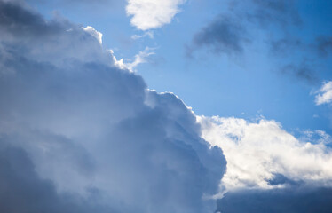 Wall Mural - blue sky with cloud closeup. Beautiful nature background with clouds.
