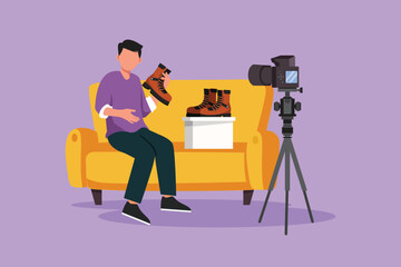 Wall Mural - Graphic flat design drawing social media influencer reviewing boots. Smiling young man vlogging about men's sports shoe and filming himself at home on a video camera. Cartoon style vector illustration