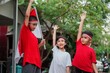 Indonesian kids boy and girl celebrate independence day at outdoor