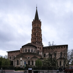 Wall Mural - Architectural detail of the Basilica of Saint-Sernin, a church in Toulouse, France, and former abbey church of the Abbey of Saint-Sernin or St Saturnin