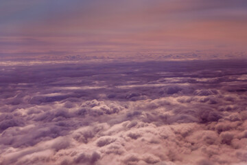 Wall Mural - abstract clouds background and texture, clouds and sky from airplane window view,