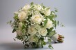 bridal bouquet composed of white roses, baby's breath, and luscious green leaves, symbolizing love and new beginnings