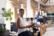 © Wavebreak Media - Portrait of happy african american colleagues with tablet in creative office
