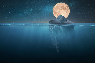 Wall Mural - amazing tip of the iceberg floats in the ocean at night with stars and full moon. hidden danger unde