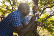 © Wavebreak Media - Senior african american couple drinking wine on sunny terrace