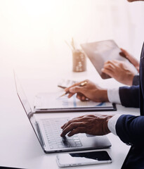 Businessman working on a laptop computer to document management online documentation database digital file storage system software records keeping database technology file access doc sharing.