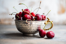 Close-up Of A Bowl Of Fresh Red Cherries