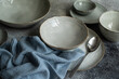 © RooM The Agency - Close-up of assorted ceramic plates and bowls on a table