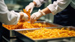catering service handling containers of pasta food