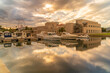 © robertharding - View of Archaeological Museum of Olbia and harbour boats on sunny day in Olbia, Olbia, Sardinia