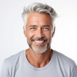 Leinwandbild Motiv a closeup photo portrait of a handsome old mature man smiling with clean teeth. for a dental ad. guy with fresh stylish hair and beard with strong jawline. isolated on white background. Generative AI