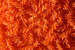 Close up image of orange lentil fusilli pasta