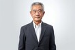 © VK Studio - Asian elderly retired male baby boomer person wearing suit on white background. Generative AI