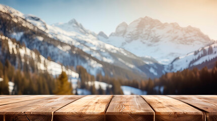 Wall Mural - Wooden table top with blur background of alpine snow capped.