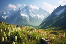 A Picturesque Alps View With Flowering Flowers, Lush, Green Meadows, And Distant Mountain Peaks Covered In Snow