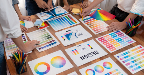 Aufkleber - Graphic designer brainstorm logo and graphic art at busy creative studio workshop. Experiment and brainstorm color palette and pattern at workspace table for creative design. Panorama shot. Scrutinize
