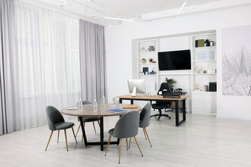 Sticker - Stylish office with comfortable furniture and tv zone. Interior design