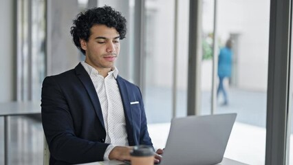 Poster - Young latin man business worker having video call smiling at office