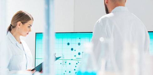 Wall Mural - team of professional scientists working on a vaccine in a modern scientific research laboratory. gen