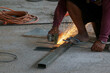 Craftsman Cutting steel without safety protection suit.