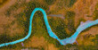 © Parilov - Aerial view of green river meander in yellow forest vegetation of delta