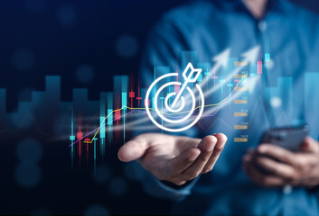 Aufkleber - Businessman hand hold target icon to planning development leadership and customer target group to success goal concept.