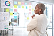 © Malambo C/peopleimages.com - Black woman, thinking and glass board for project management, marketing or planning at office. African female person, manager or employee checking project plan, tasks or statistics at the workplace