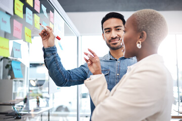 Poster - Creative people, writing and meeting on glass board for schedule planning, strategy or brainstorming at office. Man and woman in teamwork for startup project plan, sticky note or tasks at workplace