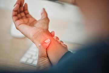 hands, business or person with wrist pain while working on a computer in office workplace with red g