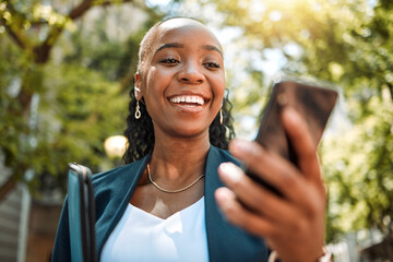 Poster - Happy black woman, phone and city for social media, communication or online browsing at the park. African female person with smile for chatting, texting or networking on mobile smartphone app outside