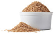 cup of paddy husk or rice husk, aka yellow rice chaff, rice husk or rice hull, outermost layer of the rice grain to use as animal feed, scattered isolated background, side view