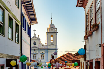 Wall Mural - Houses and church in the streets of the city of Diamantina decorated with colorful lanterns and light fixtures