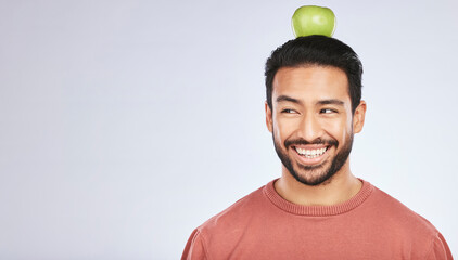 Poster - Head balance, thinking or happy man with apple decision for weight loss diet, healthy lifestyle change or nutrition choice. Studio food, fruit mockup space or hungry person ideas on white background