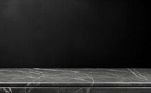 Empty Table Marble Black Countertop On Black Wall Background. High Quality Photo