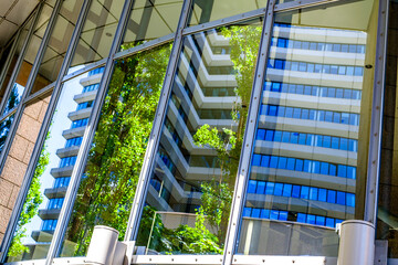 Canvas Print - typical reflection at a modern office building