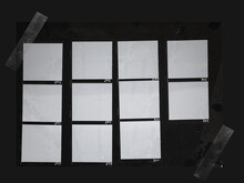 Handcopy Medium Format Paper Sheet With Empty Frames Fixed By Transparent Sticker Tape On Black Background, Cool Photo Placeholder.