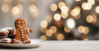 Weihnachtlicher Hintergrund mit einem Lebkuchenmännchen und Lebkuchengebäck auf einen Teller. 