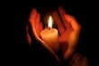 © top images - Burning candle in hands with selective focus. Concept symbol. AI generated, human enhanced