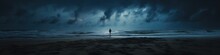 A Person Standing On A Beach Under A Cloudy Sky. Generative AI Image.