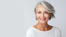 Beautiful Smiling Mature Woman With Short Gray Hair, On A Light Background. AI Generation