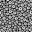 Cute seamless camomile pattern on black background