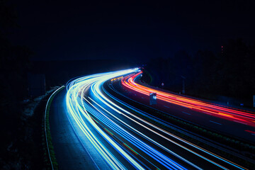 Wall Mural - Langzeitbelichtung - Autobahn - Strasse - Traffic - Travel - Background - Line - Ecology - Highway - Long Exposure - Motorway - Night Traffic - Light Trails - High quality photo	