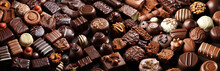 Image Of Delicious Chocolates Of Different Shapes And With Different Fillings. Horizontal Image.Generative AI