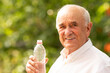 © carballo - senior man in summer drinking water