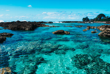 Blue water of a lagoon on Hawaii shore