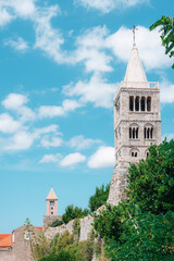 Wall Mural - Bell tower of St. Mary's church, old town of Rab on the island Rab, Croatia. Copy space