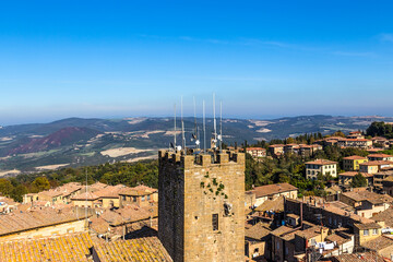 Wall Mural - olterra, Italy. View of the city with the Pig Tower from a height