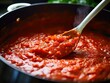 a close-up of a spoon stirring a pot of rich tomato sauce, generative ai