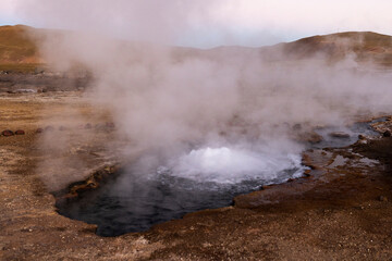 Exploring the fascinating geothermic fields of El Tatio with its steaming geysers and hot pools high up in the Atacama desert in Chile, South America
